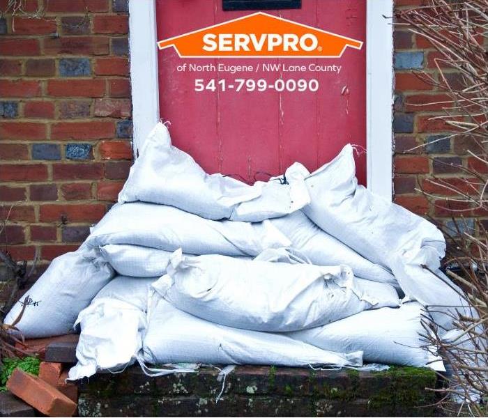 Sandbags prevent stormwater intrusion into a home.